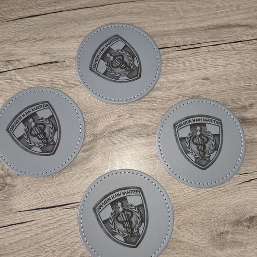 Coaster set 424 GSNE new, eco leather with emblem and motto