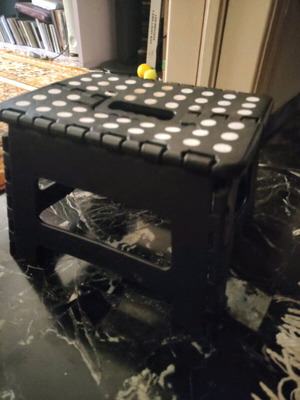 Folding children's stool used with wear but functional