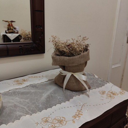 Decorative sack with dried flowers like new