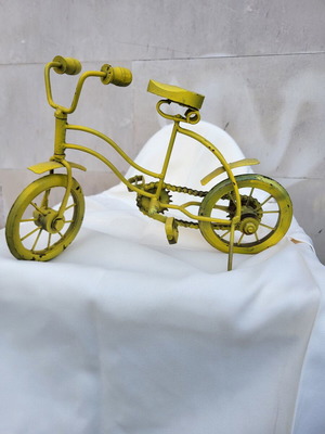 Vintage yellow metal bicycle used