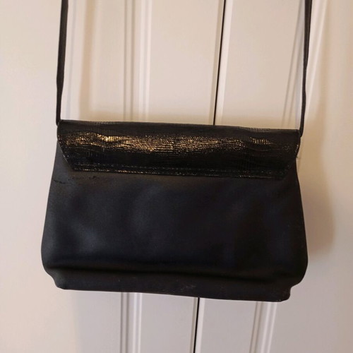 Black shoulder bag used with minor wear