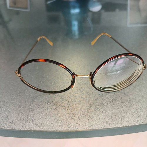 Eyeglasses used, very lightweight, gold color