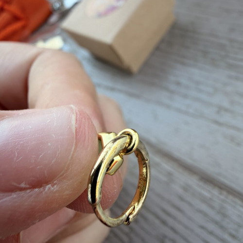 Gold-plated silver hoop earrings with green stone