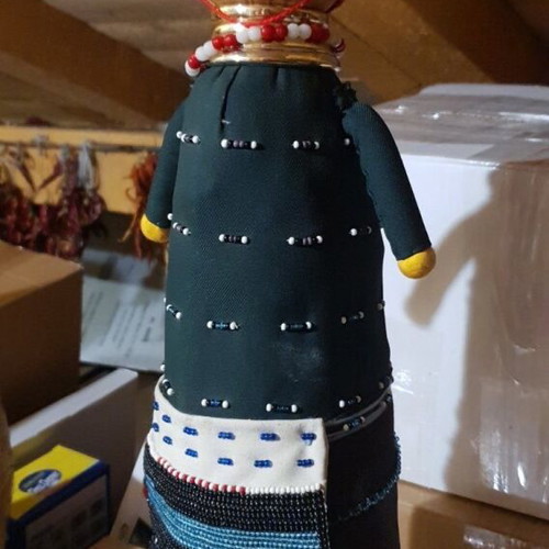Handmade doll like new, unique with beads