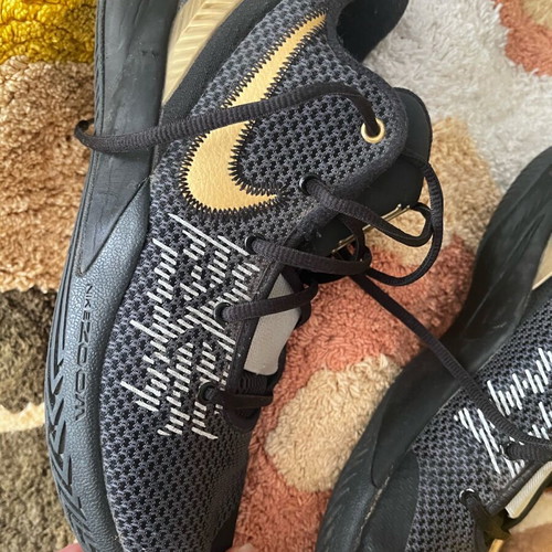 Nike athletic shoes size 42.5 used, black and gold