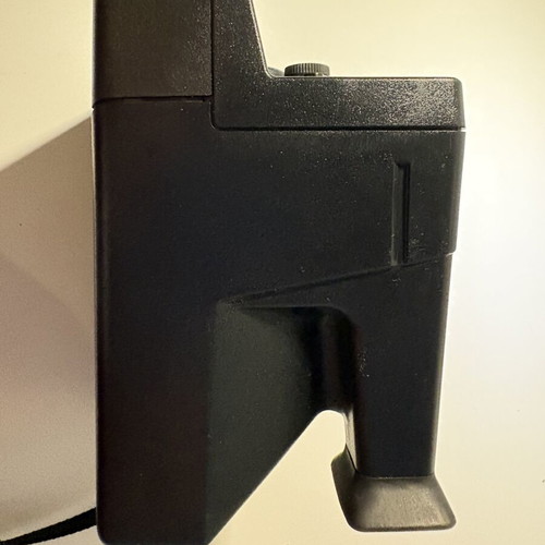 Polaroid Sonar AF 5000 instant camera with 8-frame film pack