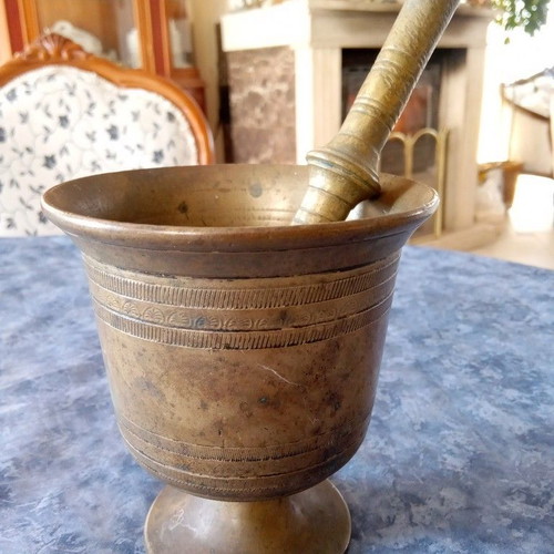 Old brass mortar and pestle