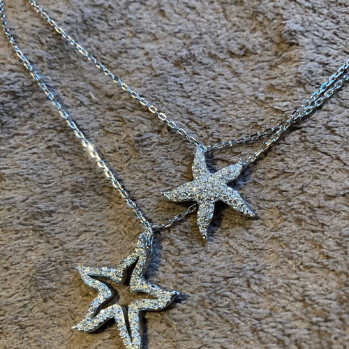 Swarovski double necklace with star pendants like new