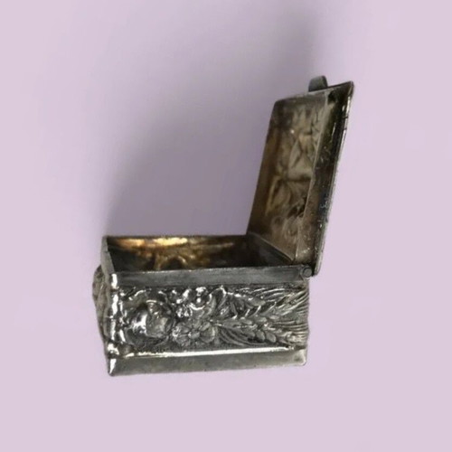 Old silver-plated pill box with embossed decoration like new