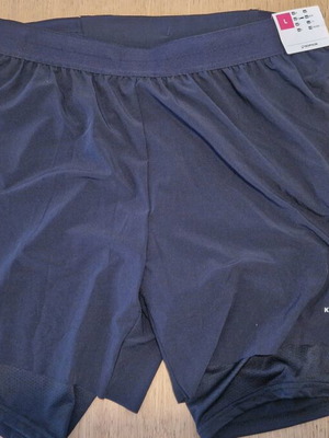 Kiprun shorts with compression lining new, size Large, black