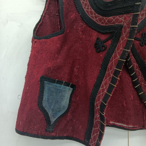Collectible traditional woolen burgundy vest used