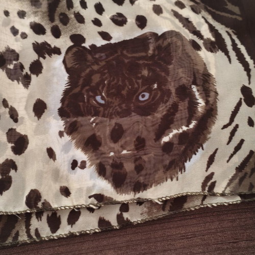 African pareo with wild feline print used, leopard and tiger patterns