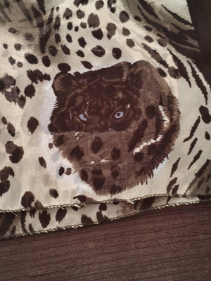 African pareo with wild feline print used, leopard and tiger patterns
