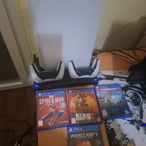 PS5 825GB Disc Edition with 2 controllers and charging cooling stand