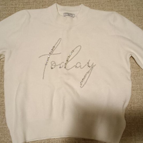White sweater with rhinestones and pearls