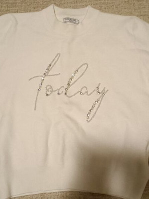 White sweater with rhinestones and pearls