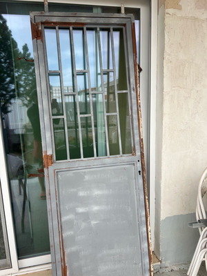 Iron door used, dimensions 77x217 cm