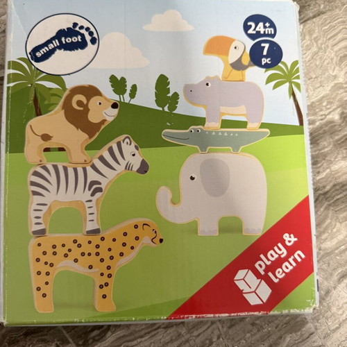 Montessori stacking and balancing game with 7 wooden animal figures