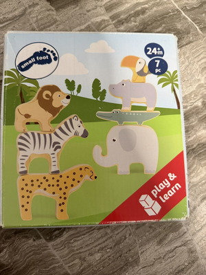 Montessori stacking and balancing game with 7 wooden animal figures