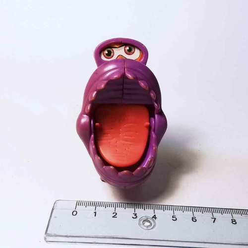 Plastic toy purple fish used with closing mouth