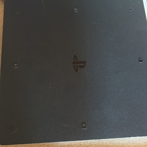 PlayStation 4 Slim 1TB console with original controller