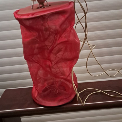 Electric decorative lantern with red fabric and LED lighting