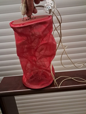 Electric decorative lantern with red fabric and LED lighting