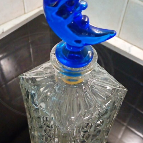 Crystal carafe like new with blue crescent moon lid