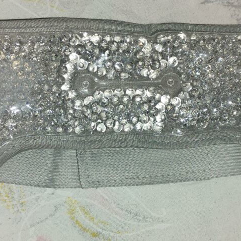 Grey gel mask with velour lining and adhesive closure, like new