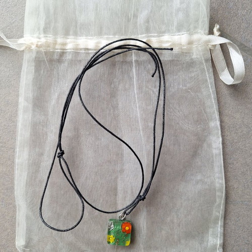 Necklace pendant with green floral design