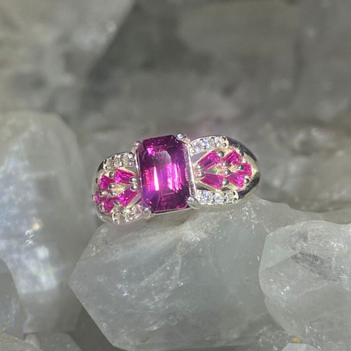 Silver ring with natural rhodolite garnet and moissanite