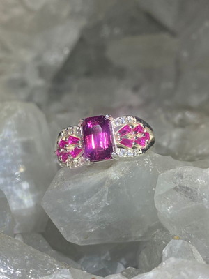 Silver ring with natural rhodolite garnet and moissanite