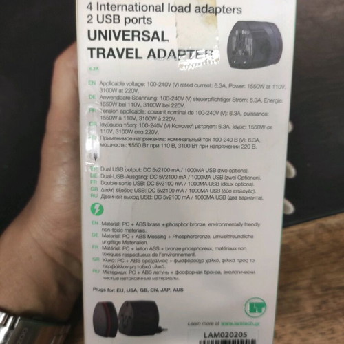 Universal travel power adapter Lamtech new with 2 extra USB ports