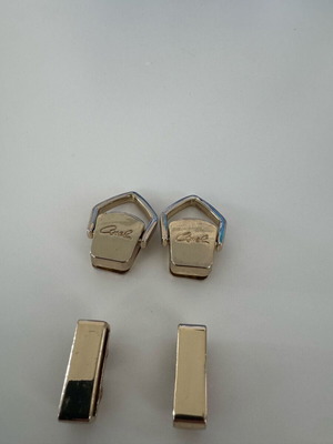 Metal accessories for Axel bags like new, gold-colored