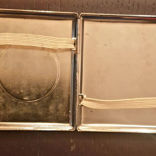 Metal cigarette case like new with embossed cannabis leaf design