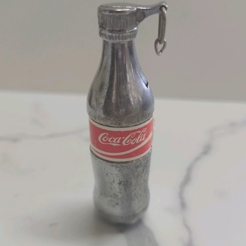 Collectible lighter used in Coca Cola bottle shape 90s