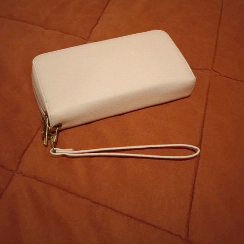 Women's wallet used, pink with detachable strap