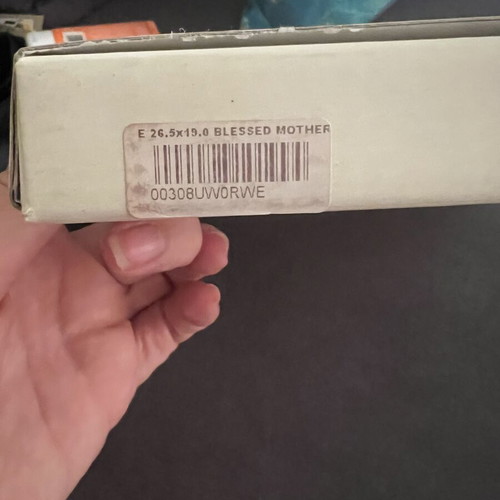 Silver photo frame new, slight tear on back plastic