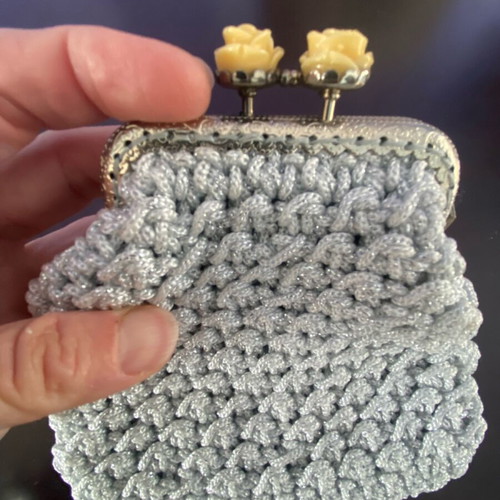 Handmade knitted wallet like new, medium size, silver with rose clip