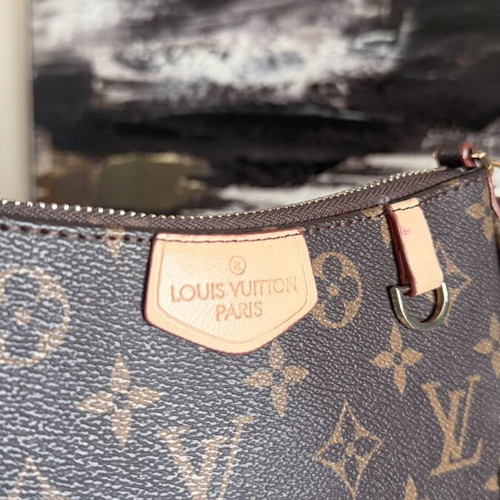 Louis Vuitton small handheld bag, leather, elegant