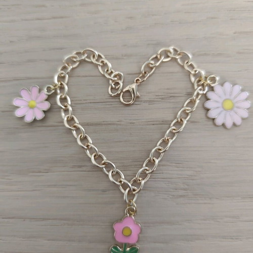 Bracelet new with pink flowers and gold chain