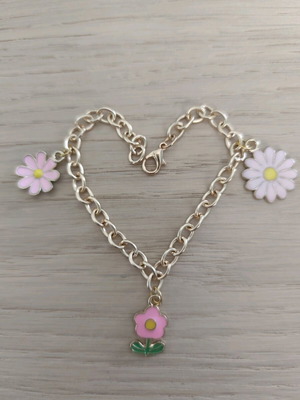 Bracelet new with pink flowers and gold chain