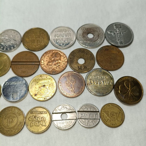 Tokens used, 30 old foreign brands for parking and car wash