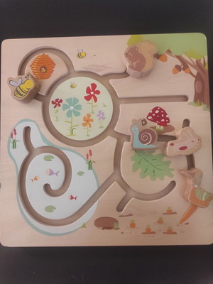 Wooden prewriting toy used by Andreu Toys