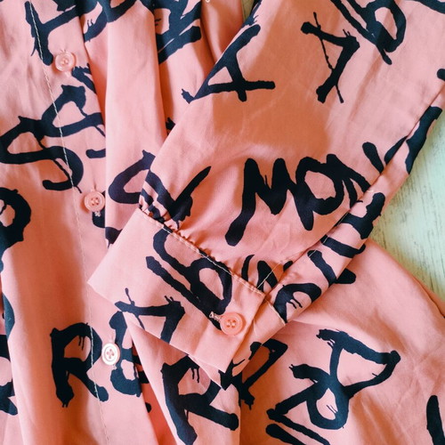 Shirt dress or tunic new, peach color with black graffiti