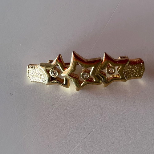 Small pin used with three stars and rhinestones gold plated