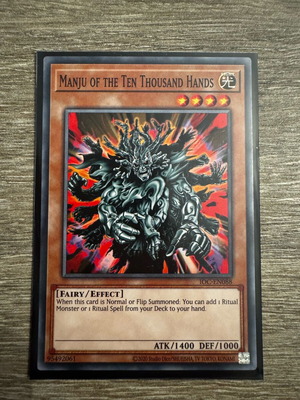 Manju of the Ten Thousand Hands YuGiOh card in perfect condition
