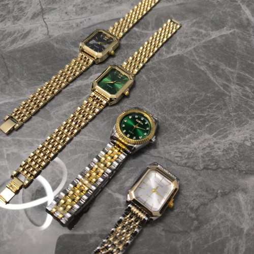 Set of 4 new women's gold watches