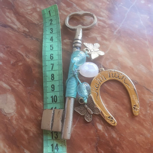Lucky key charm with horseshoe