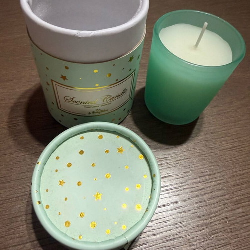 Summer Breeze scented candle in glass jar like new